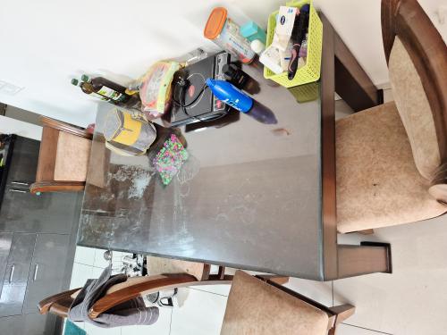 Dining table with on top glass of 4 chairs