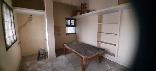 Old wooden single bed and mattress