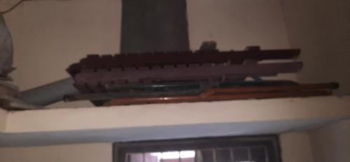 Old wooden single bed and mattress