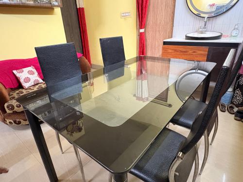 Glass top dining table