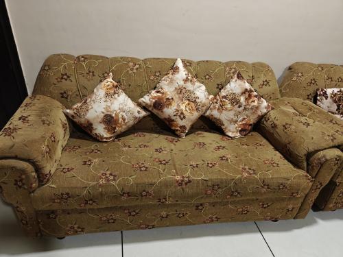 10 Seater sofa, 2 stools and 1 Table