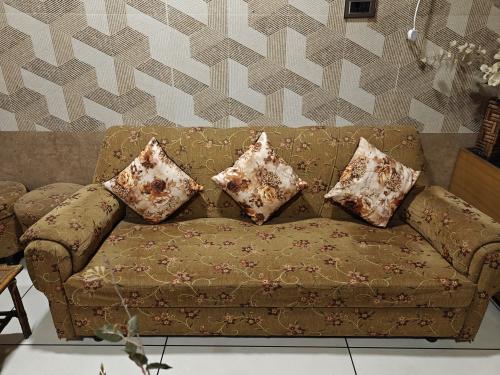 10 Seater sofa, 2 stools and 1 Table