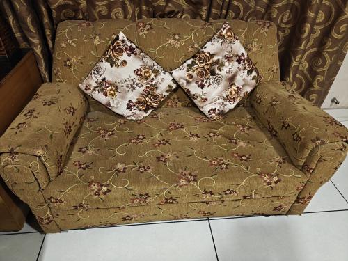 10 Seater sofa, 2 stools and 1 Table