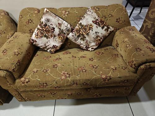 10 Seater sofa, 2 stools and 1 Table