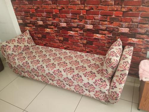 L shaped sofa 9' * 7' with 6' setty