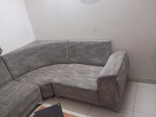 L shaped sofa 9' * 7' with 6' setty