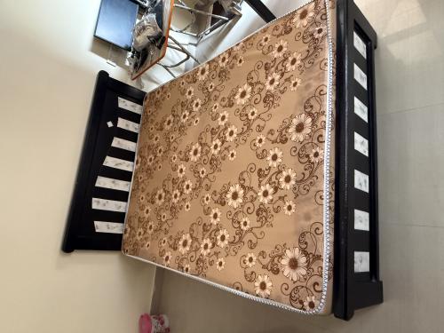 Plywood cot, Mattress, Dining table, Dressing table, Office chair and office table